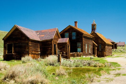 Old wooden houses and church in the historic Bodie  Historic Park in the  California gold mining ghost  town.