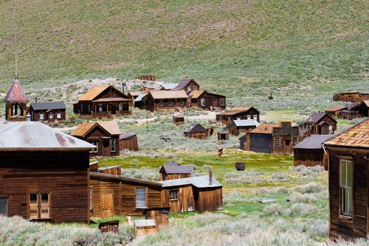 Wooden buildings in Historic Bodie Park a Californian gold mining ghost town.