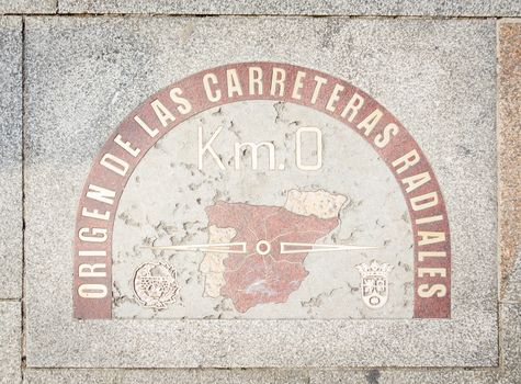 Kilometer zero point sign on the street of Puerta del Sol, in Madrid, Spain