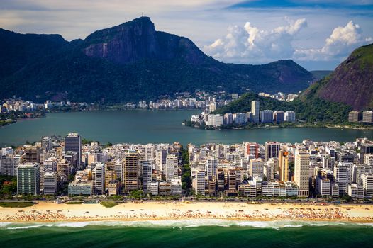 Aerial view of buildings on the beach front with a mountain range in the background, Ipanema Beach, Rio De Janeiro, Brazil