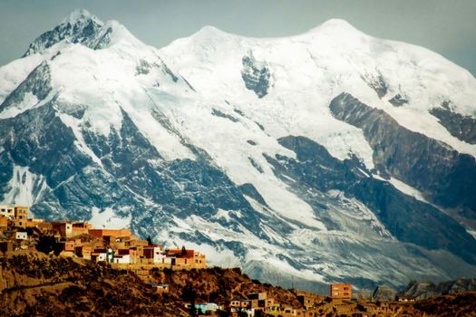 Scenic view of La Paz city with snow capped mountains in background, Bolivia.