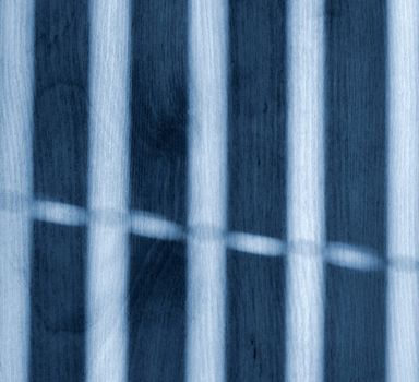 background or texture blue shadow of the window blinds on the floor