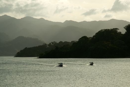 Boats on the lake near the Arenal Volcano in Costa Rica.