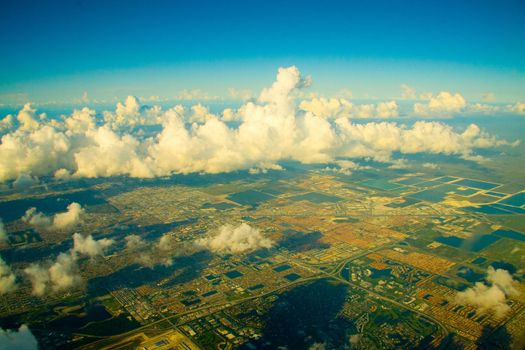 Aerial view of a landscape with clouds