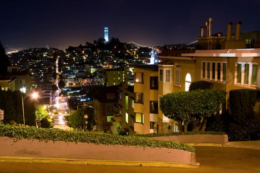 Distant night view of the Lillian Coit Memorial Tower, San Francisco, California.