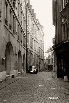 Lonely car parked on the street in a city, Geneva, Switzerland