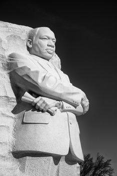 Carved stone statue of Martin Luther King Jr. at the National Mall in West Potomac, Washing ton DC.