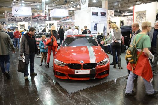ESSEN, GERMANY - November 30: Visitors admire BMW tunning by Mbdesign during Essen Motor Show in Germany, on November 30, 2013.