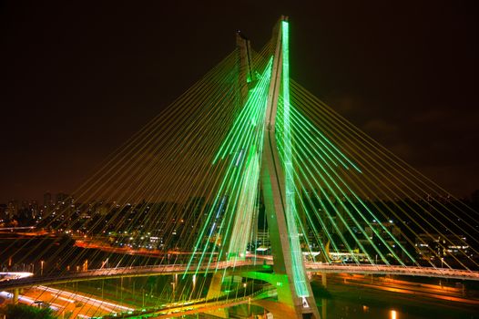 Most famous bridge lit up in the city at night, Octavio Frias De Oliveira Bridge, Pinheiros River, Sao Paulo, Brazil