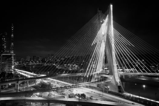 Most famous bridge lit up in the city at night, Octavio Frias De Oliveira Bridge, Pinheiros River, Sao Paulo, Brazil