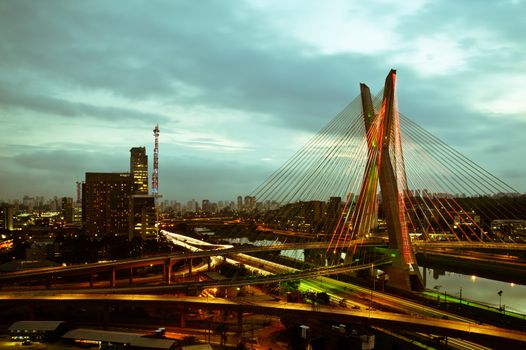 Most famous bridge in the city at dusk, Octavio Frias De Oliveira Bridge, Pinheiros River, Sao Paulo, Brazil