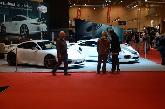 ESSEN, GERMANY - December 2: Two upgraded Porsche Carrera presented by TechArt on Essen Motor Show in Germany, on December 2, 2013.