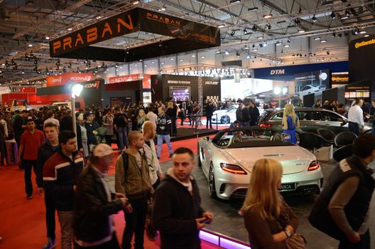 ESSEN, GERMANY - December 8: Visitors admire modern cars during Essen Motor Show in Germany, on December 8, 2013.