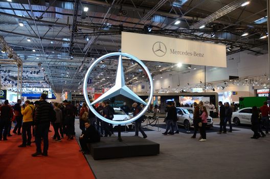 ESSEN, GERMANY - December 8: Massive Mercedes-Benz logo presented on Essen Motor Show in Germany, on December 8, 2013.