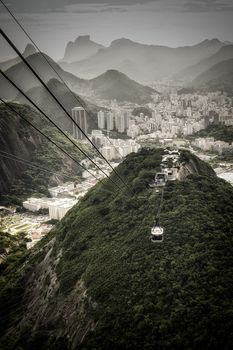 Overhead cable car approaching Sugarloaf Mountain, Rio De Janeiro, Brazil