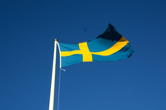 Swedish flag on a blue sky sunny day