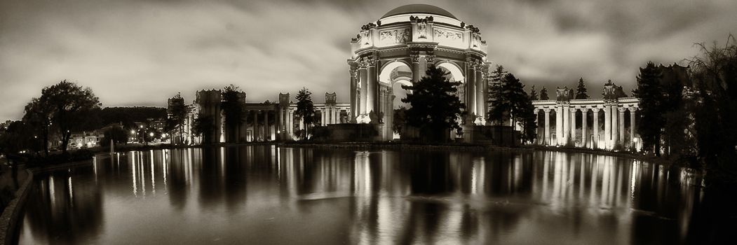 Reflection of a museum on water, Palace Of Fine Arts, Marina District, San Francisco, California, USA