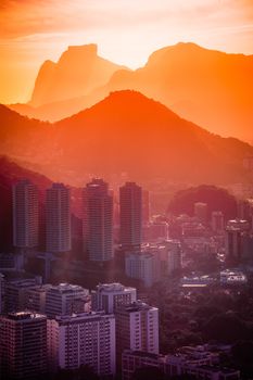 Cityscape with mountain range in the background at dusk, Rio De Janeiro, Brazil