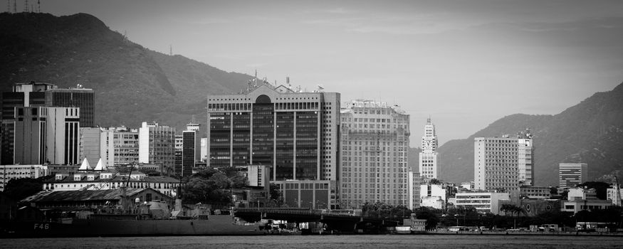 Black and white panoramic view of Rio de Janeiro city skyline viewed over Guanbara Bay, Brazil.