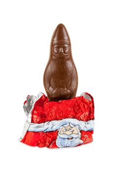 Half wrapped chocolate figure of santa Claus isolated over white background with clipping path.