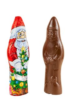 Chocolate figures of santa Claus isolated over white background with clipping path.