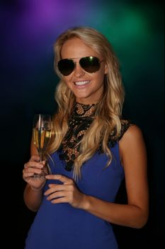 Attractive young blond lady on a night out in a club