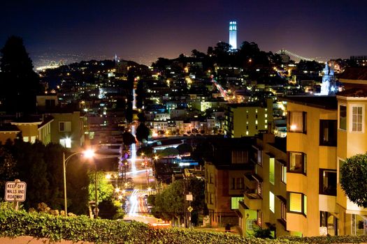 Scenic view of Coit tower viewed from Lombard Street at night, San Francisco, California, U.S.A.
