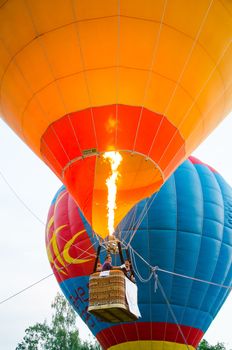 CHIANG MAI - DECEMBER 7: Unidentified pilot to prepare balloon on display at The Thailand International Balloon Festival 2013 on December 7, 2013 in Chiang Mai, Thailand.