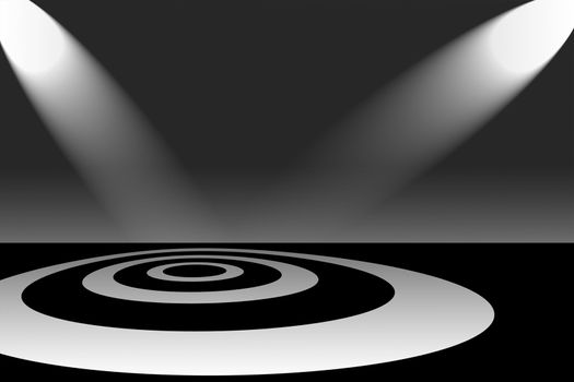 Two spotlights shining down on a stage with a target pattern of concentric circles or rings.