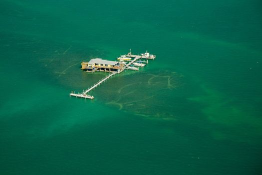 Aerial view of stilt houses and pier in the Atlantic ocean, Stiltsville, Safety Valve, Biscayne Bay, Miami, Florida, USA