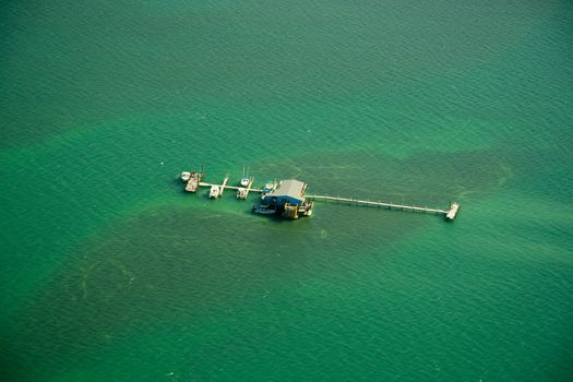 Aerial view of stilt houses and pier in the Atlantic ocean, Stiltsville, Safety Valve, Biscayne Bay, Miami, Florida, USA