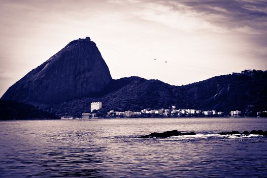 View of the Sugar Loaf from a boat at Baia de Guanabara in Rio de Janeiro, Brazil