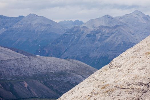 Scenic landscape of high mountain ridges and peaks alpine terrain of Northern Canadian Rocky Mountains, British Columbia, Canada