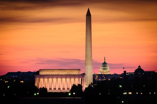 Glowing dawn sky over the skyline of Washington, DC.