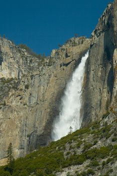 Water falling from rocks in a valley, Yosemite Falls, Yosemite Valley, Yosemite National Park, California, USA