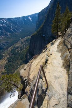 Water falling from rocks in a valley, Yosemite Falls, Yosemite Valley, Yosemite National Park, California, USA