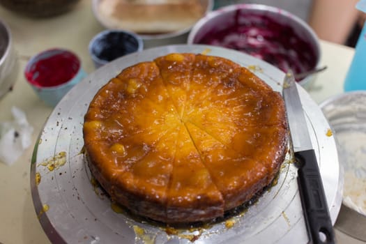 sliced cheese cake after baked in kitchen