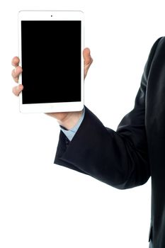 Cropped image of a man holding tablet device