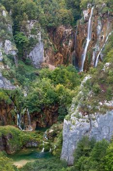 Big waterfall in vertical position, located in Plitvice Nation park in Croatia