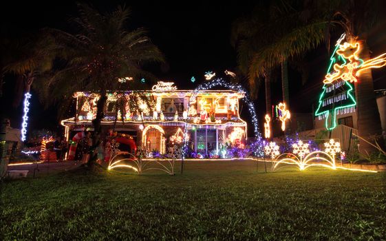 Toowoon Bay, Australia - December 10, 2013; House decorated with a variety of Christmas lights and decorations for the festive season.