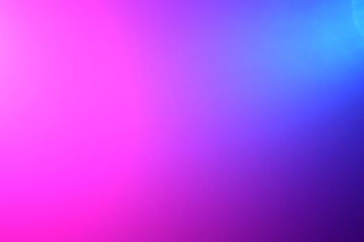 Background of pink and blue color lights shining through fog