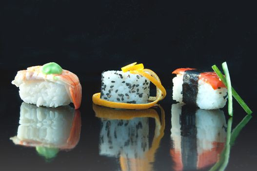 Closeup of fish and vegetable sushi snacks 