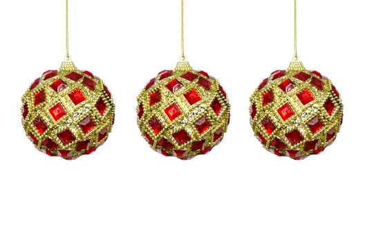 Toys for the Christmas tree, three red-yellow sphere on a white background