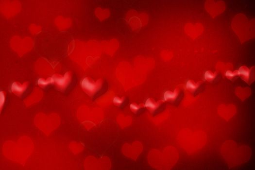 Red hearts on red grunge paper background