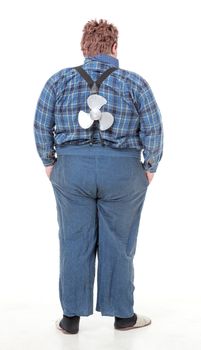 Overweight obese young man standing with his back and a small propeller blade on his back 