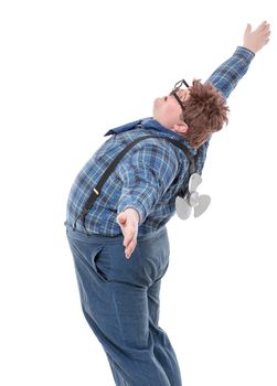 Overweight obese young man standing with his back arched and arms outstretched and a small propeller blade on his back 