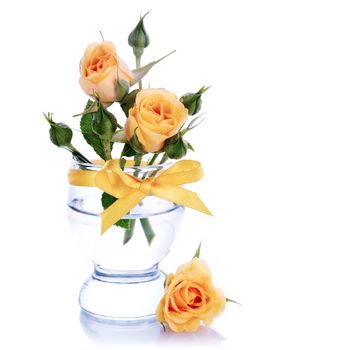  Yellow roses in a glass. Yellow flowers. Roses. Bouquet of roses.
