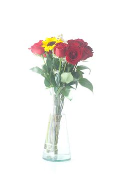 bouquet of red roses and sunflower in a vase 