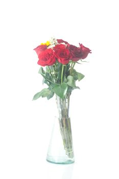 bouquet of red roses and sunflower in a vase 