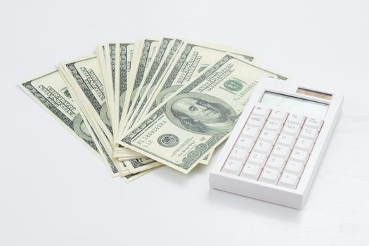US bank note and calculator on white background
